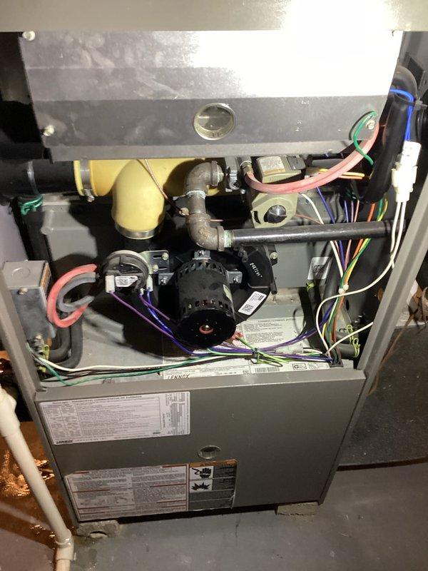 Completed scheduled air handler coil maintenance on residential HVAC system. Accessed interior components, inspected blower motor assembly and electrical connections, and documented heavy dust accumulation on blower wheel requiring attention. All wiring connections, condensate drain line, and mechanical components were examined and found to be operational, with photographic documentation captured for service records.