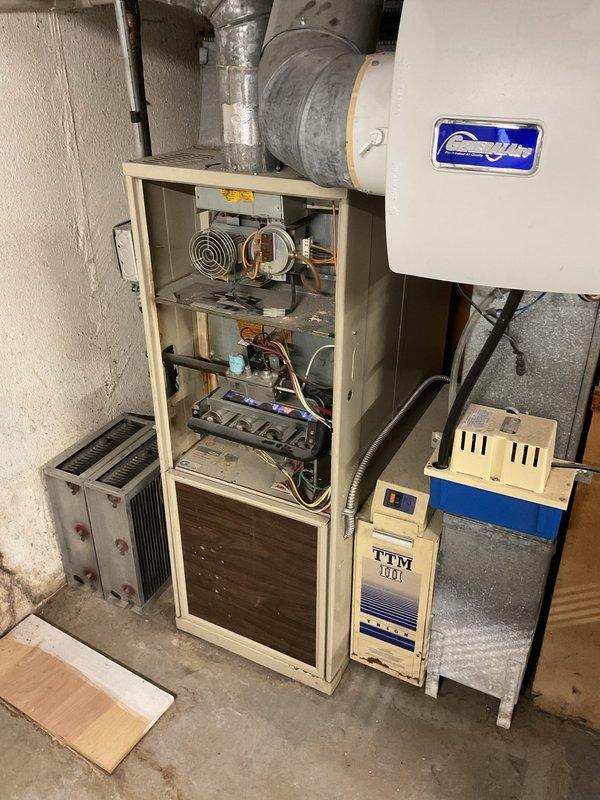 Completed annual heating and cooling maintenance on residential HVAC system. Identified and noted filter replacement requirement during inspection. Performed comprehensive system evaluation including inspection of furnace blower motor, electrical connections, control boards, and humidifier unit. All components found operational with routine maintenance completed per manufacturer specifications.