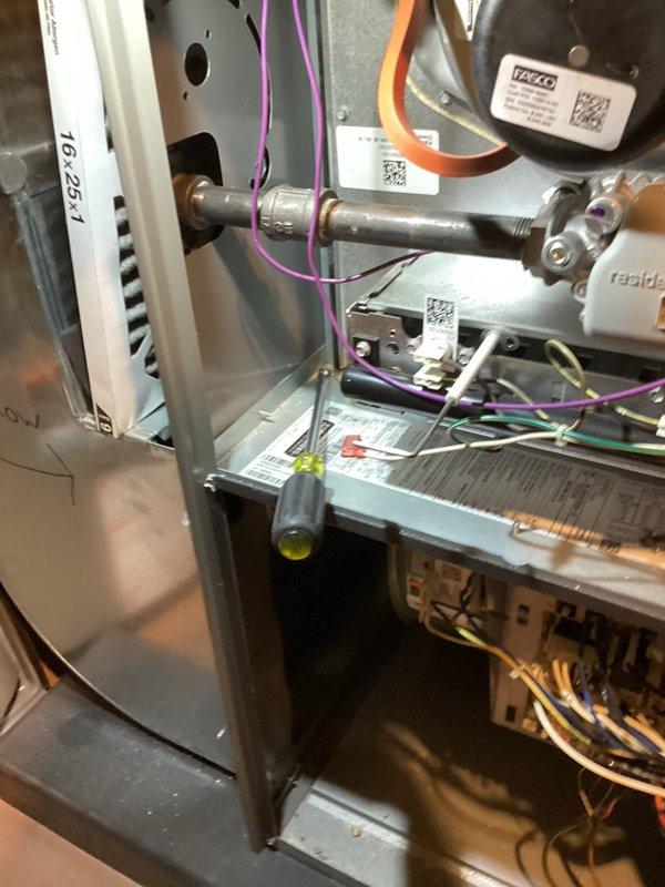 Completed annual heating and cooling maintenance on residential HVAC system. Performed comprehensive inspection of furnace unit, examining blower motor assembly, heat exchanger, electrical connections, and internal components for proper operation and safety. Verified all wiring connections secure with no signs of wear or damage. Inspected outdoor condensing unit, checking condenser coils, cabinet condition, and overall system functionality. All components found in normal working condition with no repairs required at this time.