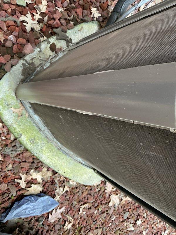 Completed routine air conditioning maintenance inspection on residential cooling system. Replaced furnace filters, inspected outdoor condenser unit with heat exchanger coils showing normal operational wear and verified proper insulation sealing at base of equipment.