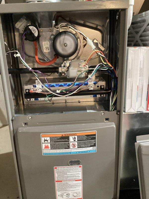 Completed comprehensive Air Care Heating and Cooling recurring maintenance service on residential gas furnace and air conditioning system. Performed thorough inspection of furnace interior components including draft inducer motor, gas valve assembly, blower motor, and all electrical connections. All wiring, control boards, and safety systems verified to be properly connected and functioning within manufacturer specifications.