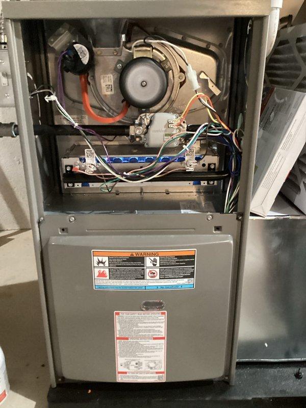 Completed comprehensive Air Care Heating and Cooling recurring maintenance service on residential gas furnace and air conditioning system. Performed thorough inspection of furnace interior components including draft inducer motor, gas valve assembly, blower motor, and all electrical connections. All wiring, control boards, and safety systems verified to be properly connected and functioning within manufacturer specifications.
