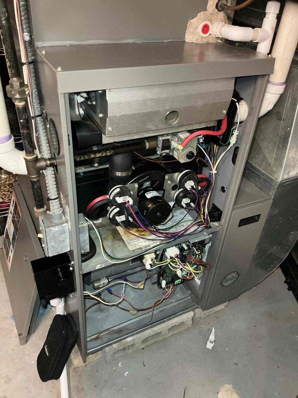 Completed complimentary annual heating maintenance through Air Care Membership on furnace system. Performed comprehensive tune-up inspection of all internal components including blower motor assembly, electrical connections, and control module. Verified proper operation of all mechanical and electrical systems, inspected wiring connections throughout unit, and documented equipment specifications and current condition with photographs. No issues identified; system operating within normal parameters.