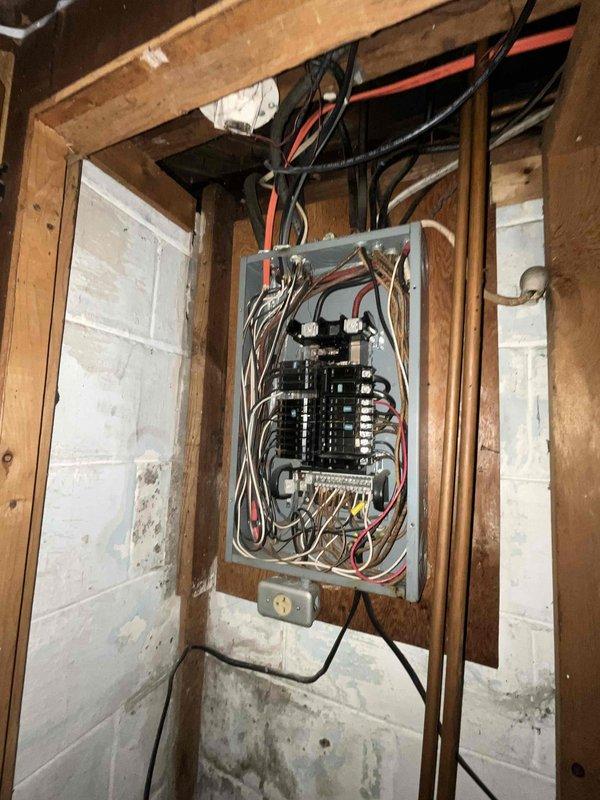 Provided estimate for furnace replacement in basement location. Current unit non-operational due to age-related failure. Assessed existing electrical panel and outdoor HVAC components to determine compatibility requirements for new equipment installation.
