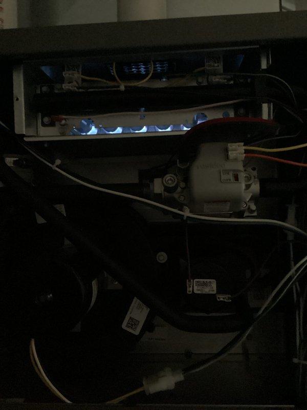 Completed annual furnace maintenance and tune-up on residential heating unit. Performed comprehensive system inspection including burner assembly examination, confirmed proper flame characteristics with uniform blue flame pattern across all burners, verified blower motor operation, inspected electrical connections and wiring throughout unit, and checked all safety controls including Resideo control components. All systems tested and operating within normal parameters. Unit photographed for service documentation.