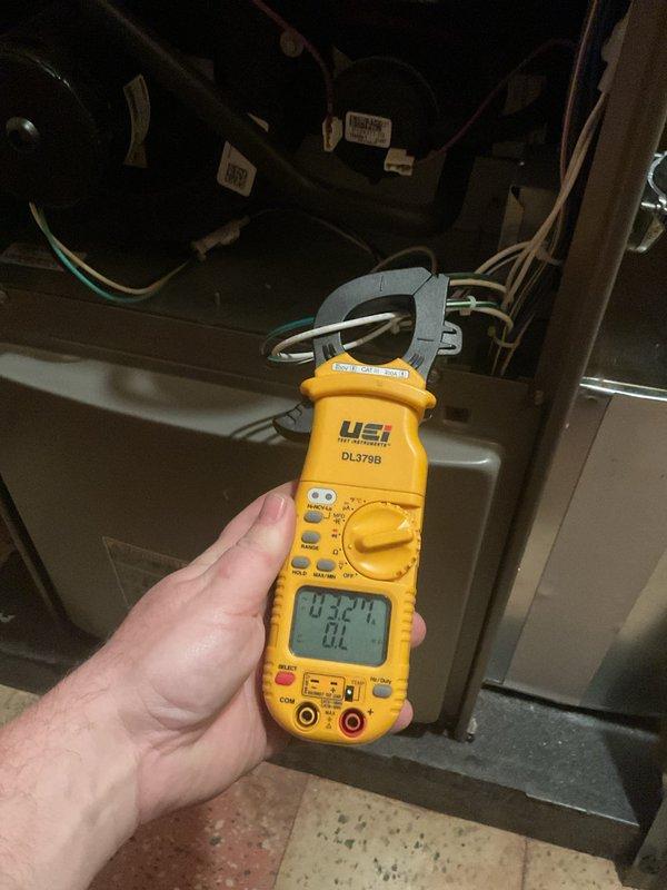 Responded to service call for furnace producing intermittent foghorn noise and performed scheduled annual maintenance on new furnace system. Conducted comprehensive system diagnostics including electrical measurements using clamp meter, which confirmed proper amperage draw at 182.4 amps. Inspected all internal wiring connections, control board components, and electrical terminals for proper operation. Completed full tune-up service including verification of all safety controls, blower motor operation, and system cycling. All components found functioning within manufacturer specifications with no issues identified related to reported noise concern.