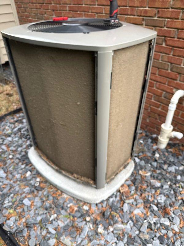 Completed annual preventive maintenance on residential split system air conditioning unit. Performed comprehensive inspection of outdoor condenser unit including visual assessment of cabinet condition, refrigerant lines, electrical connections, and condensate drainage system. Verified proper gravel pad support and clearances around equipment. Unit found in functional condition with age-appropriate wear. All components operating within normal parameters.