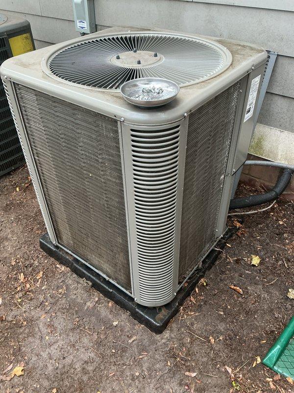 Completed annual furnace maintenance and tune-up on residential heating system. Upon arrival, system was operating properly with no reported issues. Performed comprehensive inspection of furnace components including heat exchanger, burners, ignition system, and blower assembly. Cleaned and adjusted burners as needed, verified proper flame characteristics and combustion efficiency. Checked and tested all safety controls including limit switches and flame sensors. Inspected and cleaned blower wheel and housing, lubricated motor bearings where applicable. Verified proper airflow and static pressures throughout the system. Tested thermostat operation and confirmed accurate temperature control. Inspected venting system for proper draft and clearances. Changed air filter and documented system specifications. All components found to be in good working condition with no immediate repairs required. System left operating efficiently and safely. Documented outdoor condensing unit condition during