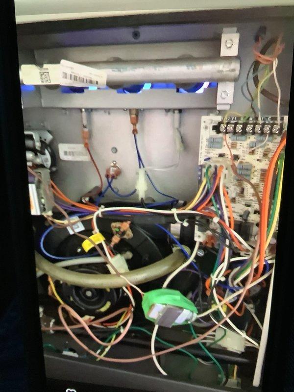 Performed scheduled maintenance on Air Conditioning Handler unit 3, including inspection of outdoor condenser coil which showed moderate dirt accumulation and debris between fins, and replacement of air filter. Documented system components including burner assembly, ignition system, electrical connections, and blower motor, all of which were found to be in operational condition during the maintenance visit.