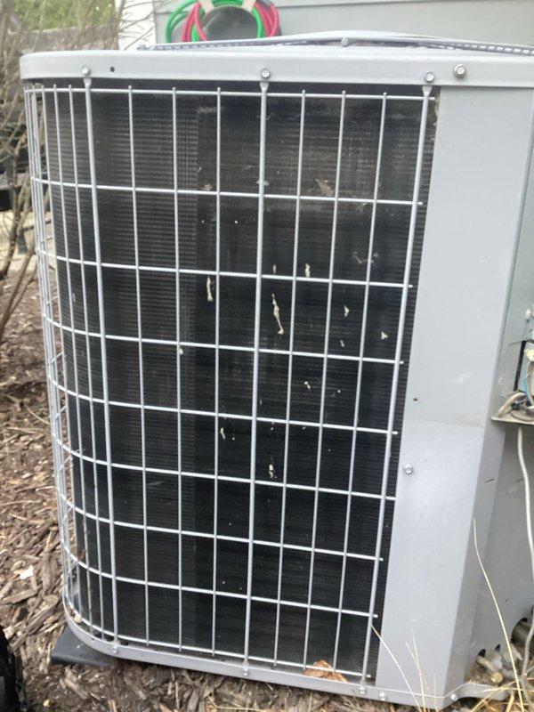 Completed annual furnace maintenance as part of preventative maintenance membership. Performed comprehensive tune-up on heating system, including inspection of all furnace components, combustion analysis, and safety checks. Documented outdoor condensing unit condition with photos showing unit operational with normal outdoor weathering, protective wire grille intact, and condenser coils visible through guard. All systems operating within normal parameters.