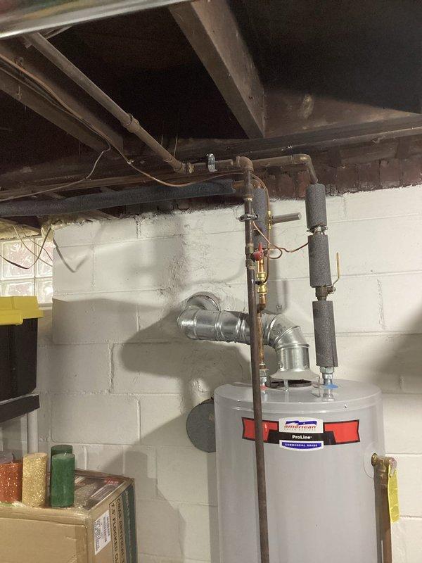 Responded to report of gas odor detected outside at furnace exhaust vent on two-year-old forced air heating system. Upon arrival, conducted comprehensive combustion analysis and gas leak detection testing throughout the mechanical space using calibrated electronic monitoring equipment. Inspected all gas piping connections, heat exchanger integrity, and venting system for potential breaches. No active gas leaks detected at furnace connections, supply lines, or exhaust termination. Combustion readings within manufacturer specifications with proper CO levels and gas pressure confirmed. Determined odor was likely residual condensate odor from normal furnace operation mixing with cold outdoor air. Verified proper draft and venting operation, confirmed all safety controls functioning correctly, and cleared system for safe operation.