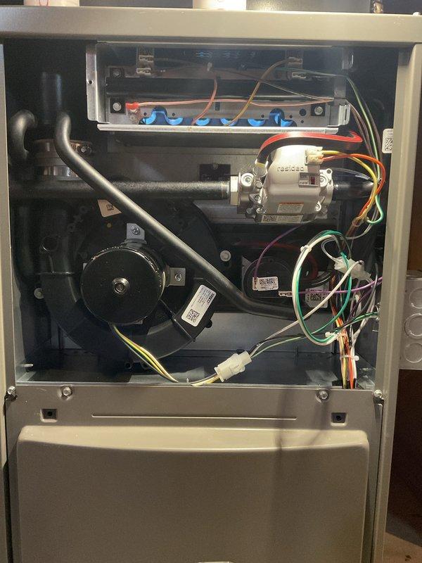 Completed comprehensive Air Care Heating and Cooling recurring maintenance service on residential HVAC system. Performed thorough inspection of high-efficiency furnace unit, including examination of internal components, gas valve connections, blower motor assembly, and all electrical wiring connections. Verified proper operation of all safety controls, confirmed filter condition, and documented equipment status with photographic records showing system in good working order.