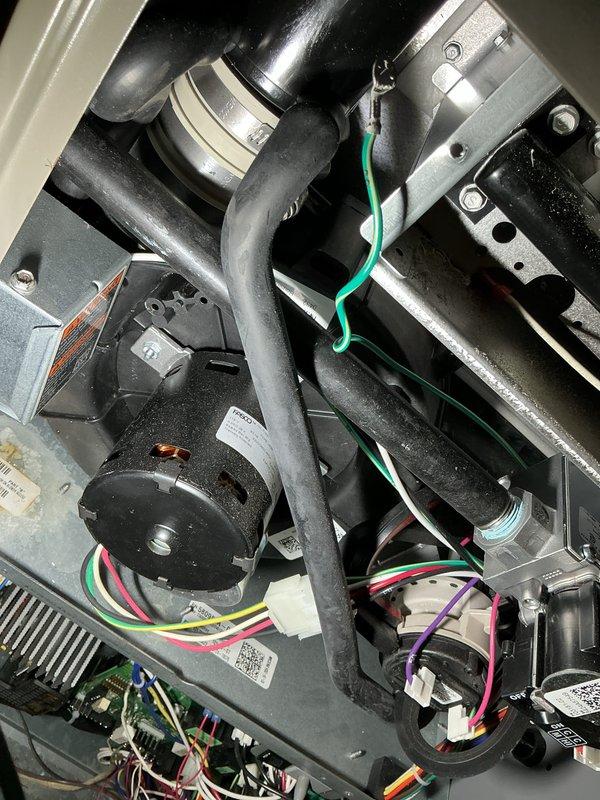 Completed scheduled AHC maintenance on HVAC system, performing comprehensive inspection of heating and cooling components. Documented internal mechanical assemblies including blower motor, gas valve assembly, ignition module, control board, wiring harnesses, and heat exchanger with photographic records. Unit requires replacement evaporative cooler pads for optimal cooling season performance.