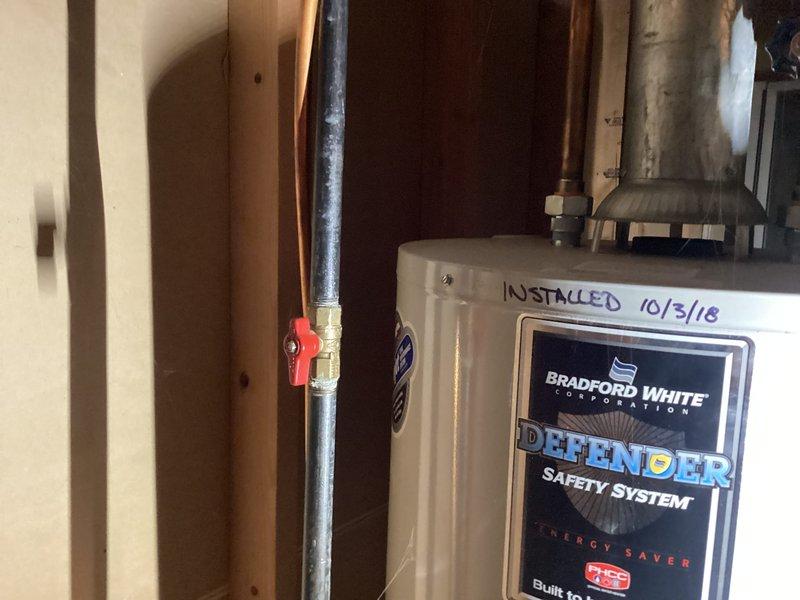Responded to no heat call for 25-year-old furnace that was completely non-operational. Upon inspection, determined the furnace had reached end of serviceable life and was beyond economical repair. Documented existing equipment including Bradford White water heater installed in 2018 and overall mechanical room condition for customer records.