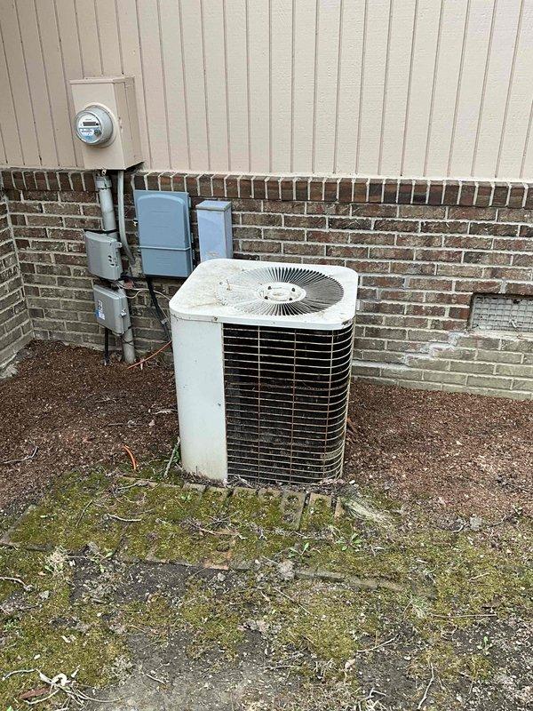 Conducted comprehensive full system estimate for residential HVAC replacement. Evaluated existing 16-year-old air conditioning condenser unit located on exterior concrete pad and 15-year-old furnace in basement mechanical room. Documented current equipment condition, including weathered outdoor condenser with vertical fin configuration and indoor gas furnace with associated ductwork and electrical connections. Assessed existing electrical infrastructure including disconnect boxes and meter configuration. Photographed both indoor and outdoor components to provide detailed equipment specifications for replacement system proposal. Customer requested replacement within the next couple of weeks due to age of existing equipment approaching end of serviceable life.