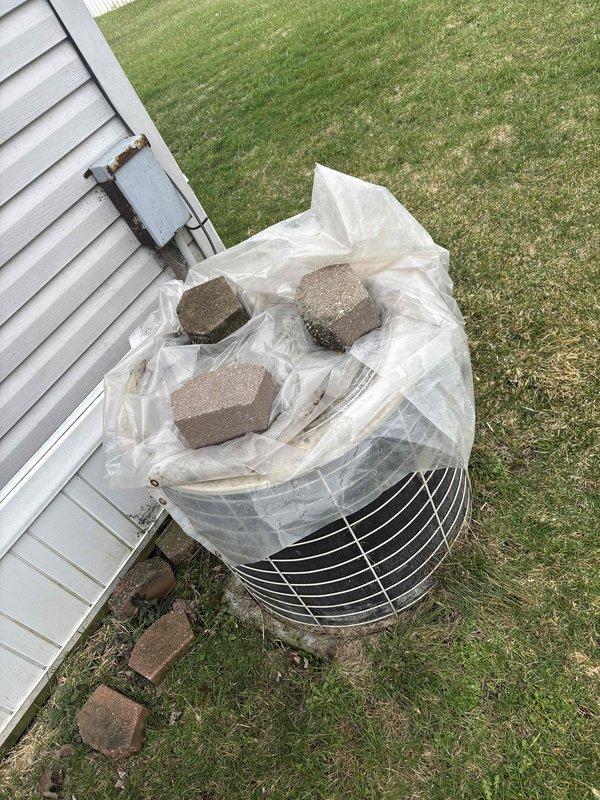 Completed estimate appointment for replacement of 33-year-old gas furnace in mobile home installation. Evaluated existing vertical furnace unit and outdoor condensing unit, documented current system configuration and condition through photographs. Provided equipment replacement options and discussed available furnace/AC promotion package with property owner.
