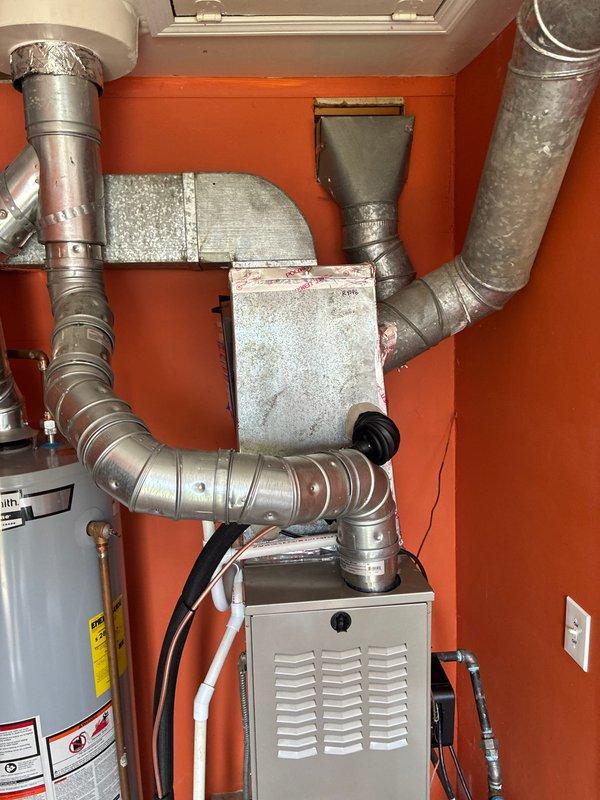 Successfully completed installation of 2-ton Lennox air conditioning system with evaporator coil at rear location of residence. Installed new outdoor condenser unit on stone pad with proper clearances, connected refrigerant lines, and integrated new evaporator coil with existing air handler in mechanical room. Completed all ductwork connections, electrical wiring, and system reconnection per mechanical and electrical permits. Evacuated refrigerant lines, charged system to manufacturer specifications, and performed full operational testing to verify proper cooling performance, airflow, and temperature differential. System operating within normal parameters upon completion.