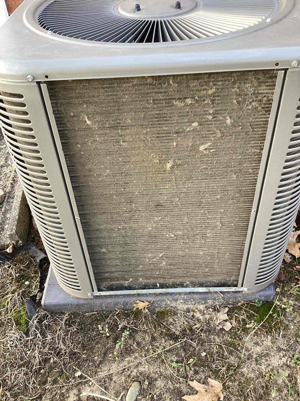 Completed annual HVAC maintenance on residential air conditioning unit. Condenser coil showed heavy accumulation of dirt, dust, and debris with significant buildup restricting airflow; performed thorough cleaning and inspection of outdoor condensing unit. Documented equipment condition with photos and renewed residential maintenance agreement.