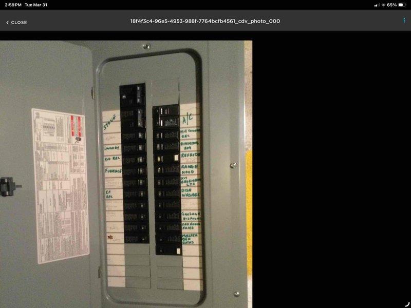 Conducted on-site assessment for standard water heater replacement in basement location. Evaluated existing 13-year-old unit currently in operational condition. Inspected electrical panel configuration and existing plumbing connections including copper supply lines, shutoff valves, and distribution piping. Documented infrastructure for standard water heater installation estimate, noting corroded fittings and aged connections at junction points beneath floor joists that will require attention during replacement.