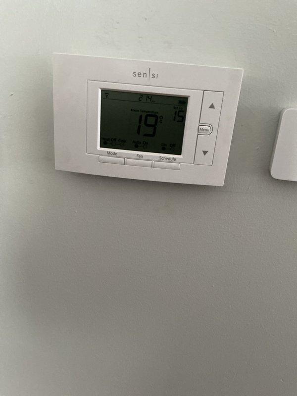 Completed comprehensive ComfortGuard maintenance inspection on residential HVAC system. Performed electrical diagnostics using clamp meter to verify proper amperage draw and system performance, inspected all internal electrical connections and wiring configurations, and confirmed thermostat operation and programming functionality. All components found operating within normal parameters with no issues identified during this routine maintenance visit.