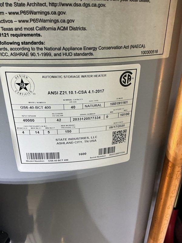 # Tanked Water Heater Leak Assessment

Responded to report of active water heater leak in residential utility closet. Upon arrival, inspected State brand 40-gallon natural gas water heater (Model GS6-40-BCI 400, manufactured 08/17/2020) and confirmed steady leak discharging into drain pan. Leak source isolated to tank body, indicating internal tank failure consistent with unit age and service life expectancy.

Documented equipment condition with photographs showing water heater installation, copper supply lines, gas connections, and manufacturer data plate with serial number 203312057734. Verified leak was contained to drain pan area with no water migration beyond immediate equipment location. Confirmed unit specifications: 40,000 BTU input, 42-gallon per hour recovery rate, natural gas fuel type.

Advised homeowner that active tank leak requires full water heater replacement as tank integrity cannot be restored through repair. Confirmed customer has active warranty coverage on water h