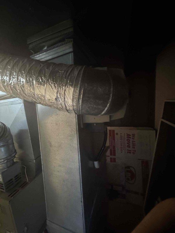 Conducted on-site assessment for complete furnace and air conditioning system replacement in basement mechanical space. Evaluated existing natural gas furnace with aging blower assembly and ductwork configuration, documented current equipment condition showing wear and dust accumulation on air handler components, and provided comprehensive replacement estimate for new HVAC system installation.