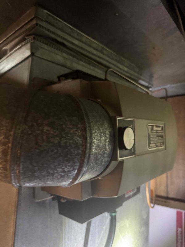 Conducted on-site assessment for complete furnace and air conditioning system replacement in basement mechanical space. Evaluated existing natural gas furnace with aging blower assembly and ductwork configuration, documented current equipment condition showing wear and dust accumulation on air handler components, and provided comprehensive replacement estimate for new HVAC system installation.