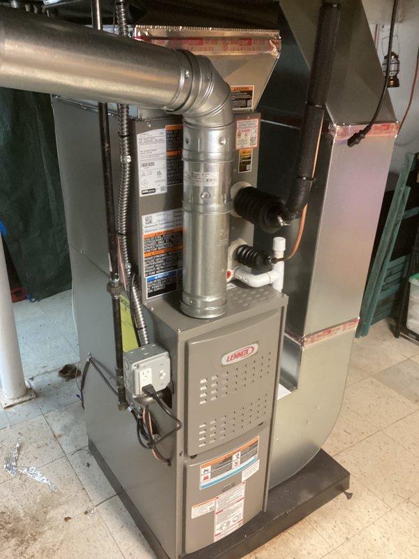 Successfully completed full HVAC system installation including a Lennox 45,000 BTU gas furnace and 1.5 ton air conditioning unit positioned on the right side of the property. Installation included proper electrical connections, mechanical hookups, supply and return ductwork with metallic transitions, refrigerant line set routing, condensate drainage, and venting systems. All equipment was mounted on appropriate platforms with proper clearances, wired according to manufacturer specifications, and reconnected to existing utilities. System was tested for proper operation, airflow verified, and all safety labels and documentation were confirmed in place.