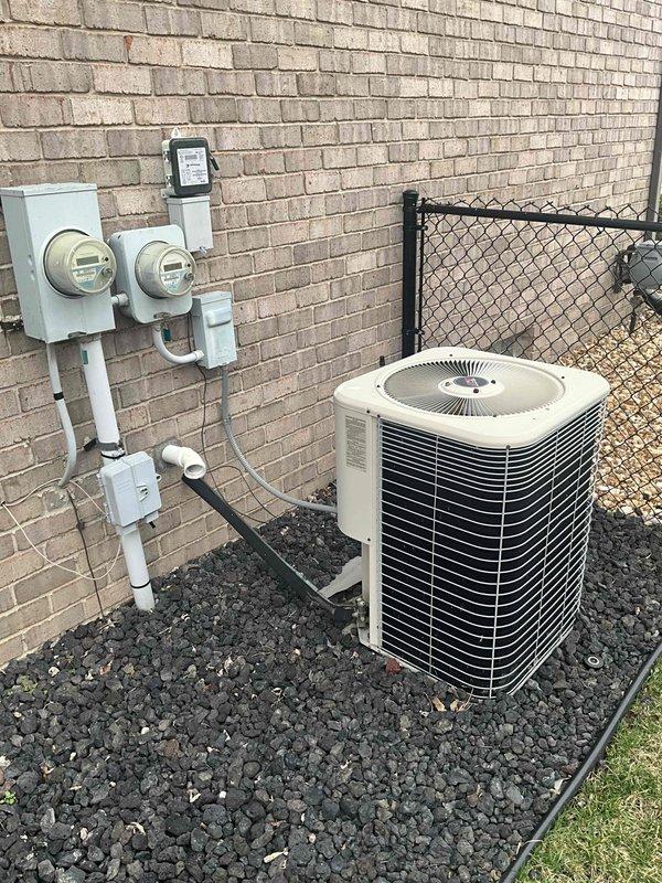 Provided comprehensive estimate for replacement of 15-year-old furnace and air conditioning system currently located in basement. Existing equipment is operational but nearing end of service life. Evaluated electrical panel configuration and outdoor condenser placement on gravel pad adjacent to brick exterior wall with proper clearances from metering equipment and condensate drainage routing.