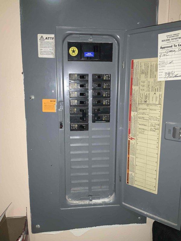 Conducted comprehensive assessment for complete HVAC system replacement at residential property with 35-year-old equipment. Evaluated existing natural gas furnace located on main floor and non-functional attic air conditioning unit requiring full replacement. Documented electrical panel configuration, existing Lennox equipment installation, and measured clearances in mechanical room to ensure proper sizing and code compliance for new system installation.