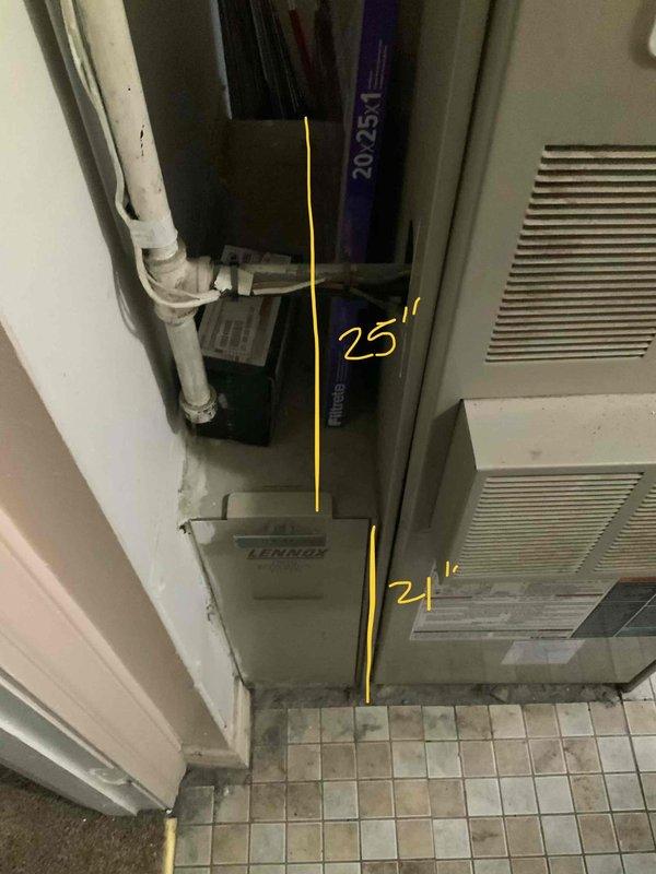 Conducted comprehensive assessment for complete HVAC system replacement at residential property with 35-year-old equipment. Evaluated existing natural gas furnace located on main floor and non-functional attic air conditioning unit requiring full replacement. Documented electrical panel configuration, existing Lennox equipment installation, and measured clearances in mechanical room to ensure proper sizing and code compliance for new system installation.