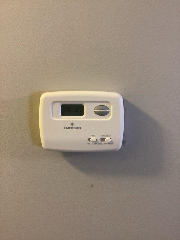 Responded to no-heat call on 7-year-old furnace following power outage. Upon arrival, found Emerson thermostat display blank and unresponsive. Verified thermostat had lost power and programming after electrical interruption. Replaced thermostat batteries, restored power to unit, and reprogrammed thermostat settings. Cycled furnace through heating sequence to confirm proper ignition, flame sensing, and blower operation. System restored to normal operation with no further issues detected.