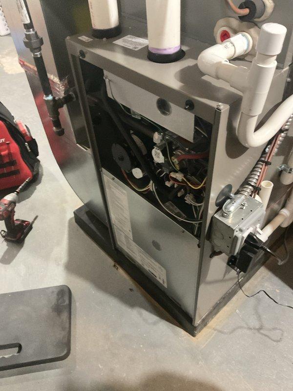 Completed annual heating maintenance on 10-year-old furnace system. Performed comprehensive tune-up including inspection of heat exchanger, burner assembly, gas valve, blower motor, and all electrical connections. Verified proper operation of all safety controls, checked combustion air intake and exhaust venting system, and confirmed unit is functioning within manufacturer specifications. System operating properly with no deficiencies noted.