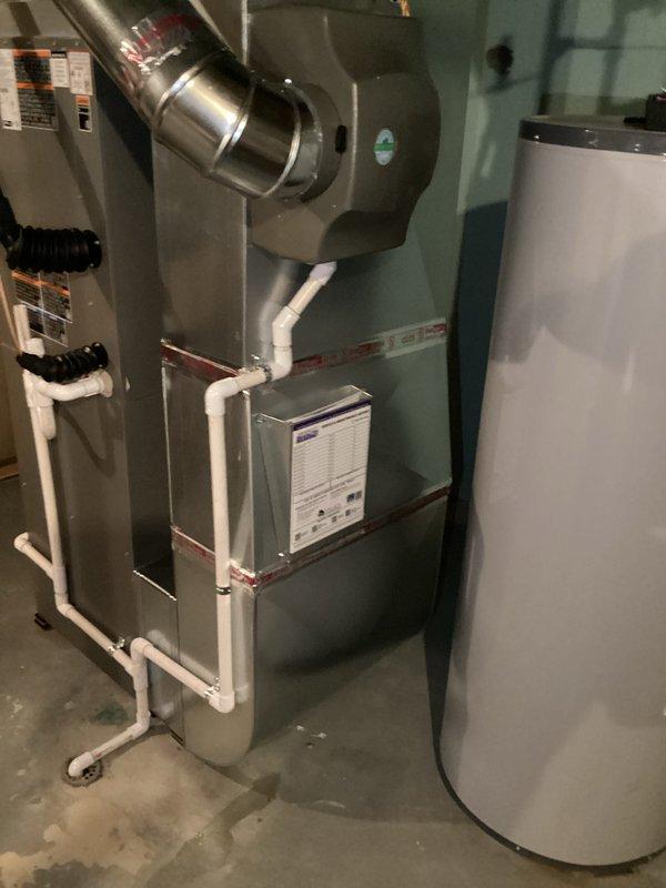 Completed full HVAC system installation including a 90,000 BTU furnace with rear return configuration and 3-ton air conditioning unit. Installed PVC venting system, condensate drainage lines, and reconnected humidifier to new furnace. All mechanical and electrical permits obtained prior to installation, and system was fully tested and operational upon completion.