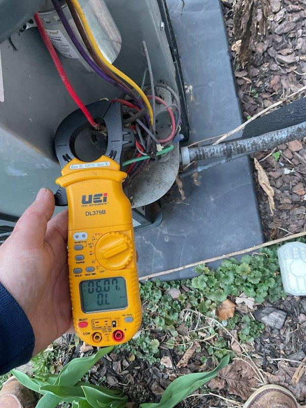 Completed annual preventive maintenance on residential cooling system. Performed electrical diagnostics using digital clamp meter to verify compressor amperage draw and system performance. Inspected outdoor condensing unit components including capacitor connections, wiring integrity, and electrical terminals. All electrical readings within manufacturer specifications. Unit operating properly with no issues found.