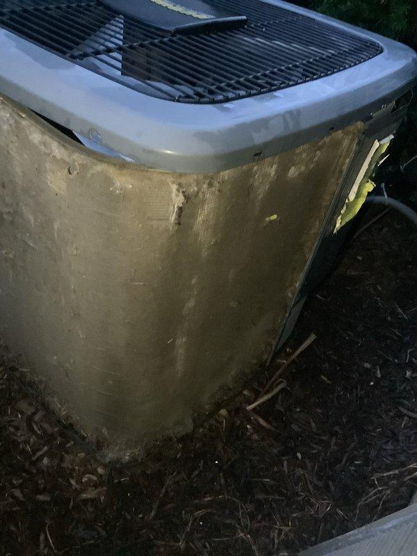 # HVAC Maintenance - ACM Completed

Performed annual cooling maintenance on residential outdoor condenser units. Both units exhibited heavy accumulation of dirt, grime, and organic debris on exterior cabinets, requiring thorough cleaning. Inspected all accessible components, cleared vegetation and mulch debris from around units, and verified proper airflow through protective grilles. Documented pre-service condition showing significant environmental soiling and weathering on exterior surfaces. Completed standard preventive maintenance procedures including visual inspection of cabinet condition, fan guard integrity, and unit positioning on concrete pad and mulch base. All units operational following service completion.