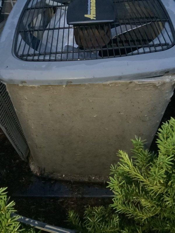 # HVAC Maintenance - ACM Completed

Performed annual cooling maintenance on residential outdoor condenser units. Both units exhibited heavy accumulation of dirt, grime, and organic debris on exterior cabinets, requiring thorough cleaning. Inspected all accessible components, cleared vegetation and mulch debris from around units, and verified proper airflow through protective grilles. Documented pre-service condition showing significant environmental soiling and weathering on exterior surfaces. Completed standard preventive maintenance procedures including visual inspection of cabinet condition, fan guard integrity, and unit positioning on concrete pad and mulch base. All units operational following service completion.