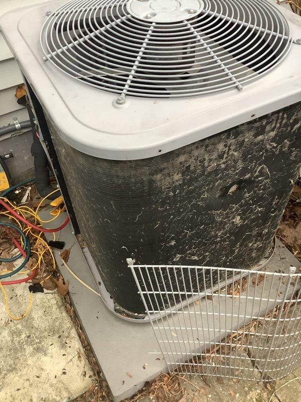 Completed scheduled preventative maintenance on outdoor air conditioning condenser unit. Upon arrival, found unit operational but with significant accumulation of dirt, debris, and organic matter on exterior surfaces and protective wire cage. Inspected all accessible components including fan assembly, refrigerant lines, and electrical connections. Cleaned condenser coils, removed debris from surrounding area and wire guard, and verified proper airflow through fan grille. Checked refrigerant line insulation and electrical connections for integrity. Unit tested and confirmed operating within normal parameters upon completion of maintenance service.