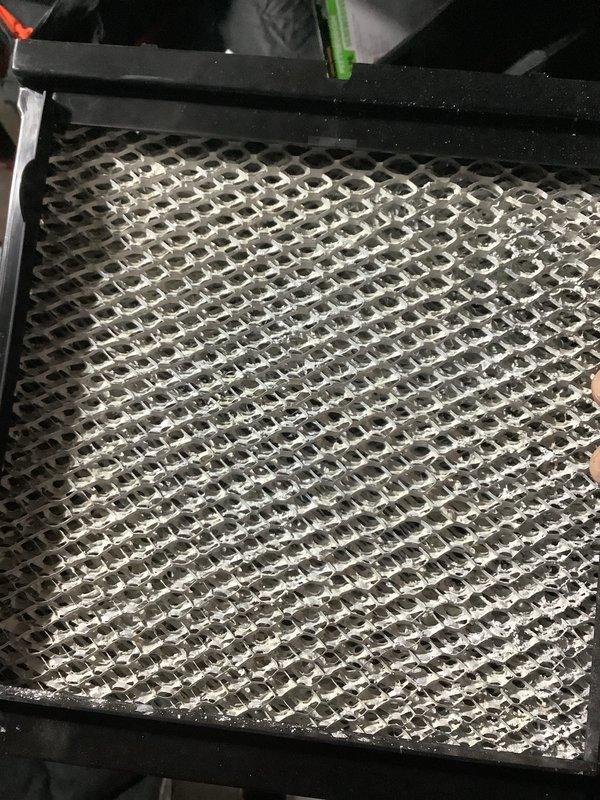 Performed routine air handler maintenance on rooftop air conditioning unit. Inspected and replaced dirty air filters, removing heavily soiled mesh pre-filter and installing new pleated filter media to restore proper airflow and system efficiency.