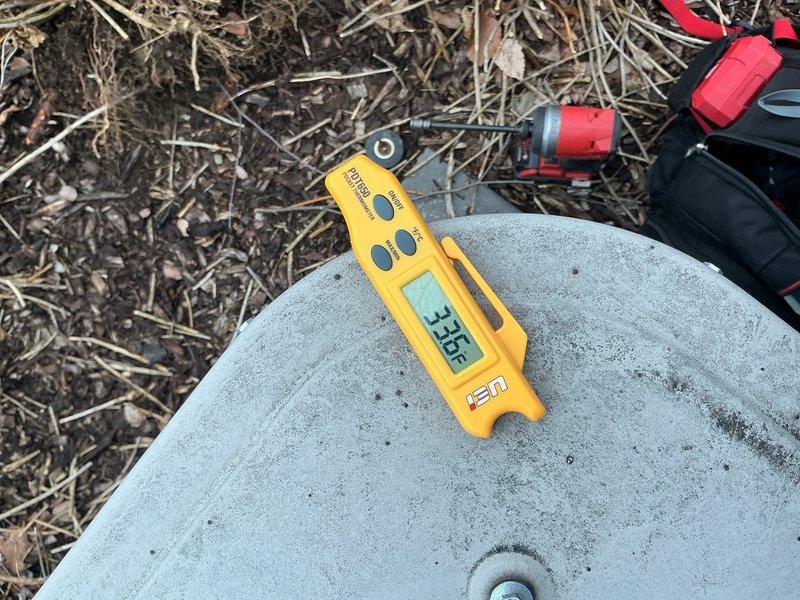 Completed scheduled air conditioning maintenance on residential split system unit. Inspected electrical components including capacitor and contactor, verified refrigerant line connections, and documented system operating on concrete pad with proper grounding in place.