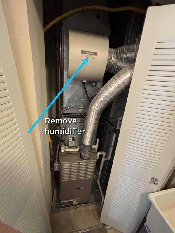 Completed on-site evaluation for replacement of 23-year-old gas furnace and air conditioning system in condominium unit. Assessed existing HVAC equipment installed in narrow closet space, including furnace with metallic ductwork and mounted humidifier unit. Documented current system configuration and noted humidifier removal required for new installation. Provided comprehensive estimate for complete furnace and AC replacement under promotional offer.