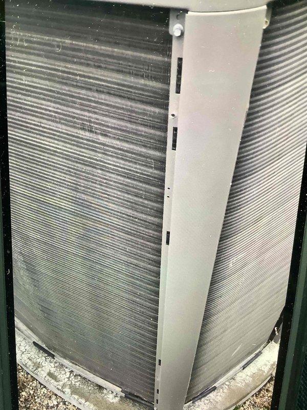 Completed annual HVAC maintenance on outdoor condensing unit, performing comprehensive inspection of heat exchanger coils, measuring system performance with diagnostic equipment, and verifying proper operation of all components. Unit showed normal operational wear with minor debris accumulation on fins; all readings within acceptable parameters and equipment functioning properly.