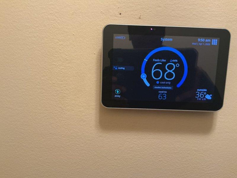 Completed spring preventative maintenance on 2-year-old Lennox air conditioning system. Performed comprehensive tune-up including inspection of all major components, verified thermostat operation and calibration at 68°F setpoint, confirmed proper system cycling and temperature control functionality. Checked refrigerant levels, cleaned condenser coils, inspected electrical connections, and tested safety controls. System operating within manufacturer specifications with no deficiencies noted. Unit ready for cooling season.