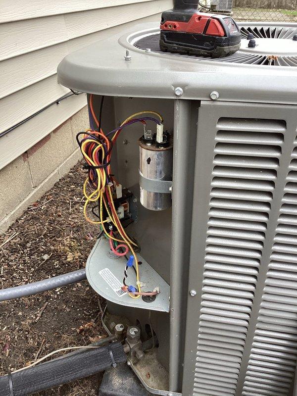 Performed comprehensive AC tune-up and coil-only maintenance on residential central air conditioning system under active membership plan. Accessed outdoor condensing unit, inspected electrical components including capacitor and wiring connections, and evaluated condenser coil condition. Unit exhibited moderate dirt and debris accumulation on aluminum fin coil surfaces and surrounding base area, which is typical for outdoor installations. Verified system operational status and confirmed proper function of all accessible components. System currently operating within normal parameters with no immediate service concerns identified at time of maintenance visit.