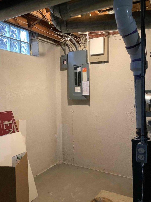 Conducted comprehensive site assessment for new Kohler whole home generator installation at residential property. Evaluated existing electrical infrastructure including main service panel with circuit breaker configuration and available capacity for generator integration. Assessed exterior installation location adjacent to gas meter and utility connections, documenting clearance requirements, proximity to existing PVC conduit runs, and adequate space for generator placement on landscaped area. Provided estimate for complete generator system installation including automatic transfer switch, electrical connections, gas line integration, and code-compliant mounting pad.