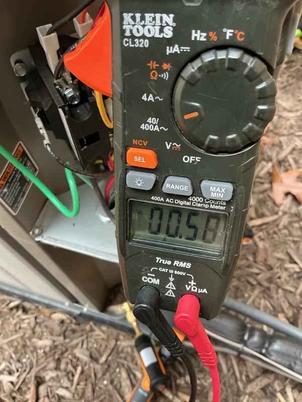Completed scheduled Air Care Heating and Cooling maintenance on Lennox HVAC system. Verified thermostat operation showing system cooling to 65°F setpoint with current temperature at 69°F and external humidity at 36%. Performed electrical diagnostics using clamp meter, confirming proper amperage draw at 0.58A, indicating normal system operation and component functionality.