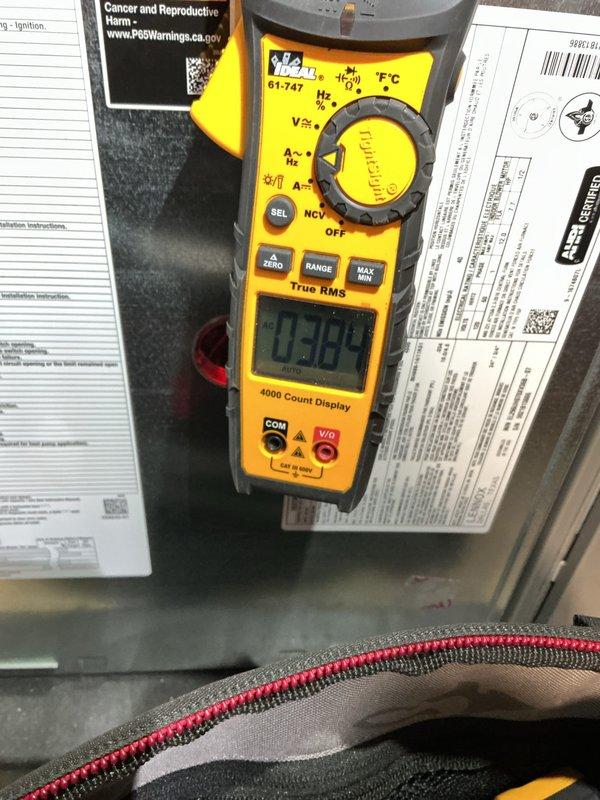 Completed comprehensive ComfortGuard maintenance visit on HVAC system, performing standard diagnostic testing and system evaluation. Utilized digital clamp meter to measure electrical parameters including amperage draw and voltage levels, and employed non-contact voltage tester to verify electrical readings at 33.9 volts, ensuring all electrical components were operating within manufacturer specifications and system was functioning safely and efficiently.