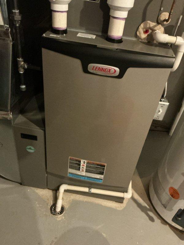 Completed comprehensive ComfortGuard maintenance package on five-year-old Lennox forced air heating and air conditioning systems. Performed full tune-up procedures on both units including filter inspection, electrical connection testing, refrigerant level verification, condensate drain line check, thermostat calibration on ecobee smart thermostat, and complete system performance evaluation. All components operating within manufacturer specifications with no deficiencies noted.