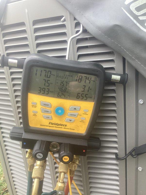 Completed annual cooling maintenance on residential air conditioning system. Connected digital manifold gauges to measure system pressures and temperatures, verifying proper refrigerant charge and operational parameters across all readings. Performed standard ACM inspection protocol on outdoor condenser unit, documenting equipment condition through diagnostic testing and visual assessment of components.