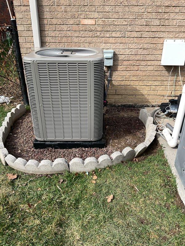 Completed full HVAC system installation including a 90,000 BTU furnace with humidifier and 3-ton air conditioning unit with rear discharge configuration. Obtained mechanical and electrical permits prior to installation, ensuring all work met local code requirements. Positioned outdoor condenser unit on platform with proper clearances against exterior wall, installed electrical disconnect box with conduit routing, and completed all refrigerant line connections and electrical reconnections to restore full system operation.